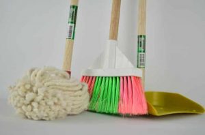 An Image of A broom, Dustpan and a mop