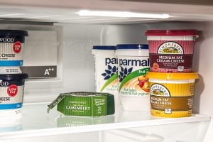 Cheese products in a fridge