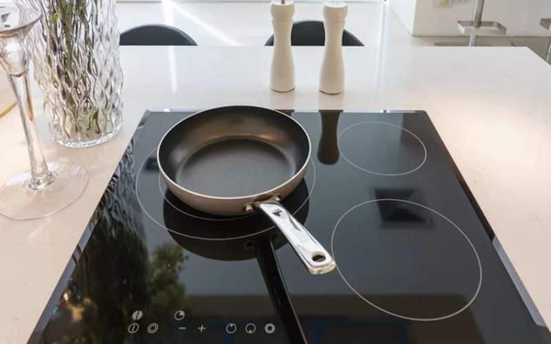 A pan on a Glass stove top