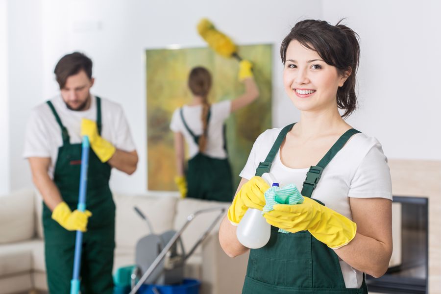 Three house cleaning professionals working in Mississauga home