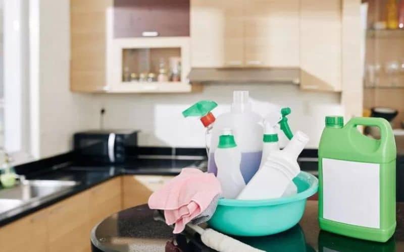 Bottles of DIY disinfectant spray on kitchen island in Mississaauga home